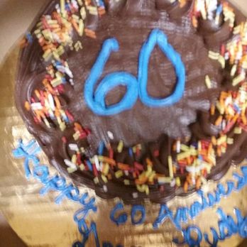 502 Baking Company - Scratch made lemon cake w/ dark chocolate frosting. Supposedly serves 4-6.... actually serves 8-10 normal people! Ha! - Bakeries Near Me - Brick Township, New Jersey