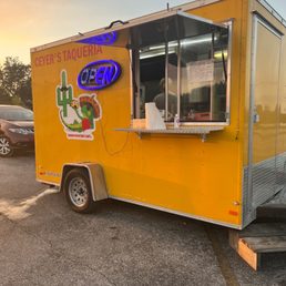 a food truck in a parking lot