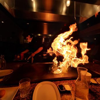 Canton Palace - a man cooking in a restaurant - Chinese Near Me - Loveland, Colorado Canton Palace - a man cooking in a restaurant - Chinese Near Me - Loveland, Colorado