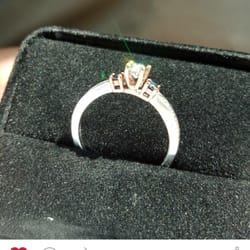 Kay Jewelers - What a beautiful ring! See the rose gold holding the black diamonds?