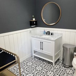 Unique Ultrasound - Super clean facility with baby changing station .