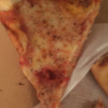 Sciarrinos Pizza - The amount of oregano on top of one slice. Some had even more but I ate those. - Pizza Near Me - Wilmington, Delaware