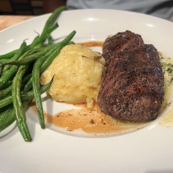 Seasons 52 - Wood-Grilled Kona-Crusted Lamb Loin with Yukon mash - New American Near Me - Jacksonville, Florida Seasons 52 - Wood-Grilled Kona-Crusted Lamb Loin with Yukon mash - New American Near Me - Jacksonville, Florida