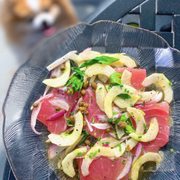 Photo of Jeninni Kitchen + Wine Bar - Pacific Grove, CA, United States. Yellowfin Crudo w/ lemon cucumber, red onion, parsley, capers, olive oil, lemon | $19
