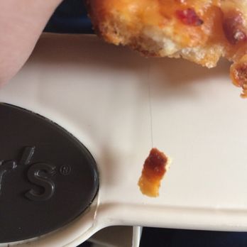 Zachary's Chicago Pizza - Hair coming out of the crust with a piece dangling - Pizza Near Me - Berkeley, California Zachary's Chicago Pizza - Hair coming out of the crust with a piece dangling - Pizza Near Me - Berkeley, California