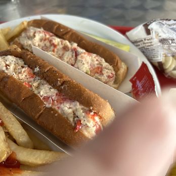 The Lobster Stop - I take the bite fist - Seafood Near Me - Quincy, Massachusetts The Lobster Stop - I take the bite fist - Seafood Near Me - Quincy, Massachusetts