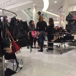 Forever 21 - Two stories, clusters of cackling women