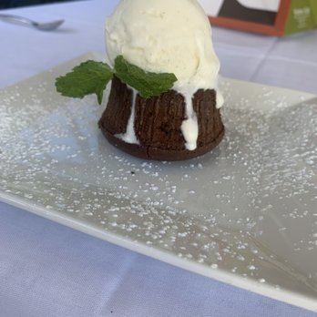 Vintner Grill - Chocolate lava cake with vanilla ice cream - New American Near Me - Las Vegas, Nevada Vintner Grill - Chocolate lava cake with vanilla ice cream - New American Near Me - Las Vegas, Nevada