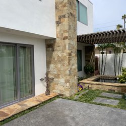 California Land Care - Custom water feature and Stamped cement with rock ascent.