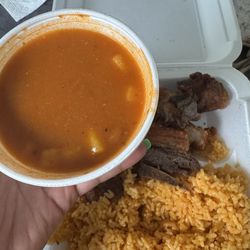 Chicharron with yellow rice and beans