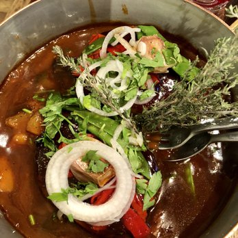 Les Papilles - Lamb shoulder braised for seven hours and then caramelized with a torch. OMG - Wine Bars Near Me - Paris, 75
