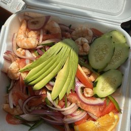 a salad in a styrofoam container a salad in a styrofoam container