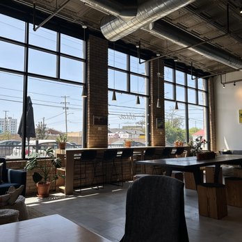 Aldea Coffee - Quiet and clean industry space with cool air condition - Coffee & Tea Near Me - Muskegon, Michigan