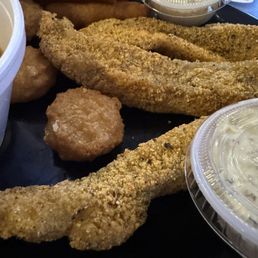 Fried catfish, hush puppies, corn fritters Fried catfish, hush puppies, corn fritters