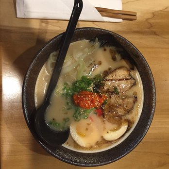 Sheng Ramen - Another picture of the tonkatsu ramen with perfectly cooked ramen egg, chashu and spicy sauce in the middle. - Ramen Near Me - Charlotte, North Carolina Sheng Ramen - Another picture of the tonkatsu ramen with perfectly cooked ramen egg, chashu and spicy sauce in the middle. - Ramen Near Me - Charlotte, North Carolina