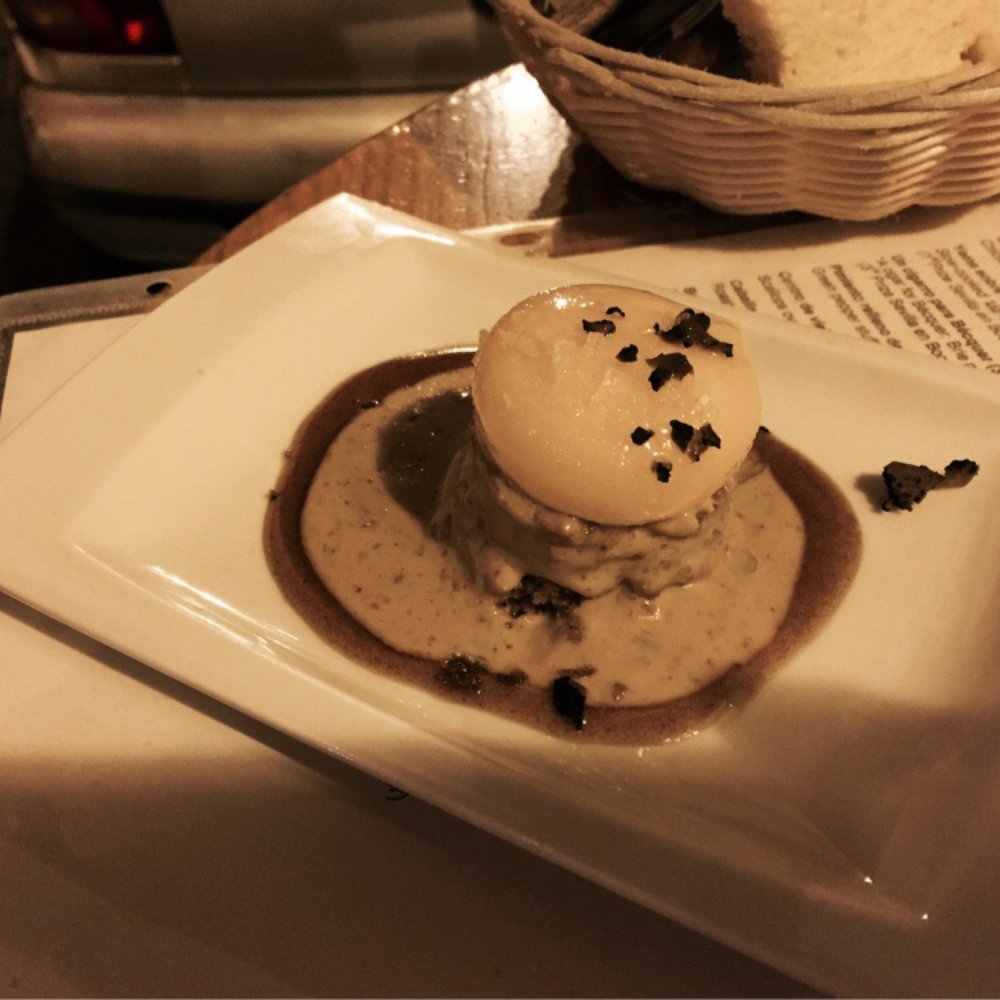 Eslava - Poached egg over a mushroom cake - Tapas Bars Near Me - Seville, SE Eslava - Poached egg over a mushroom cake - Tapas Bars Near Me - Seville, SE