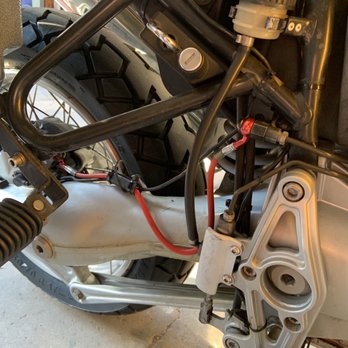 Rapid Cycle Works - Notice the extra 6 inches of red brake line looped around the drive shaft because it's too long. - Motorcycle Repair Near Me - Grand Rapids, Michigan Rapid Cycle Works - Notice the extra 6 inches of red brake line looped around the drive shaft because it's too long. - Motorcycle Repair Near Me - Grand Rapids, Michigan