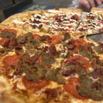 NYPD Pizza - Half Carnegie Hall Chicken Club and half meat lovers. - Pizza Near Me - Orlando, Florida NYPD Pizza - Half Carnegie Hall Chicken Club and half meat lovers. - Pizza Near Me - Orlando, Florida