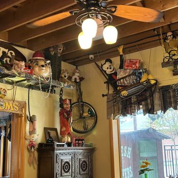 Buddy Lou's Eats Drinks & Antiques - Example of the decor lining the walls. That Mickey Mouse is a little freaky - New American Near Me - Hancock, Maryland