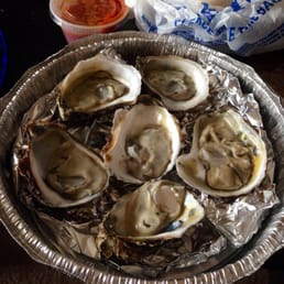 Half-dozen of shucked oysters. Super fresh!! Half-dozen of shucked oysters. Super fresh!!