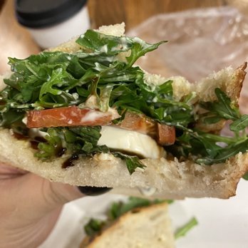 Alaskan Sourdough Bakery - a hand holding a sandwich - Bakeries Near Me - Seattle, Washington Alaskan Sourdough Bakery - a hand holding a sandwich - Bakeries Near Me - Seattle, Washington