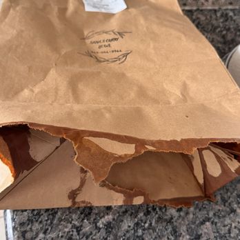 Sana's Restaurant - Bag broken from the restaurant not wrapping the containers in plastic wrap - Indian Near Me - Mission Viejo, California Sana's Restaurant - Bag broken from the restaurant not wrapping the containers in plastic wrap - Indian Near Me - Mission Viejo, California