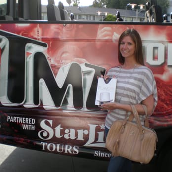 TMZ Tours - Me with the signed Flavor Flav biography I won during the tour - Bus Tours Near Me - Hollywood, California