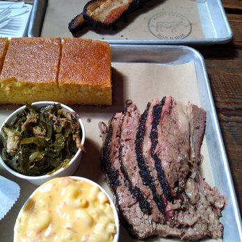 Hometown Bar-B-Que - Front: Mac and cheese, collard greens, brisket Middle: cornbread Back: pastrami bacon - Barbeque Near Me - Brooklyn, New York Hometown Bar-B-Que - Front: Mac and cheese, collard greens, brisket Middle: cornbread Back: pastrami bacon - Barbeque Near Me - Brooklyn, New York