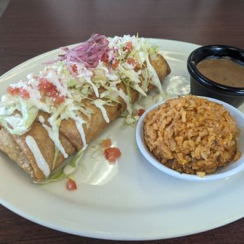 Rancho Grill - Shredded beef chimichanga with beans and rice. - Mexican Near Me - Tucson, Arizona