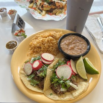 Mission 19 Taquería - 2 Birria tacos with Rice and Beans, and a Horchata - Mexican Near Me - Monterey, California Mission 19 Taquería - 2 Birria tacos with Rice and Beans, and a Horchata - Mexican Near Me - Monterey, California