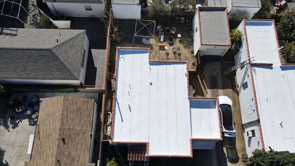 Slide of Rafael and Iris Roofing