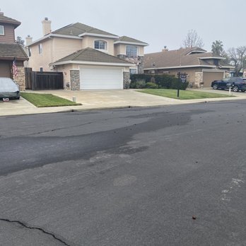 Lexington Home Services - a driveway with a car parked on the side of the road - General Contractors Near Me Lexington Home Services - a driveway with a car parked on the side of the road - General Contractors Near Me