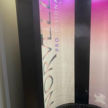 Tanlines wellness sun & spa - Norvell Auto-Revolution sunless spray booth - Tanning Near Me - Toledo, Ohio