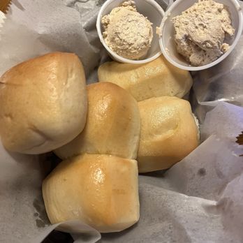Texas Roadhouse - Bread rolls with cinnamon butter - Steakhouses Near Me - Omaha, Nebraska Texas Roadhouse - Bread rolls with cinnamon butter - Steakhouses Near Me - Omaha, Nebraska