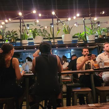 DOMU - Kitchen wide open to dining room. Very clean and organized - Ramen Near Me - Orlando, Florida
