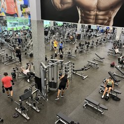 Unique Fitness Xtreme - Benches and dumbbells to the right, pin/plate machines to the left, cardio rear left, entrance rear right