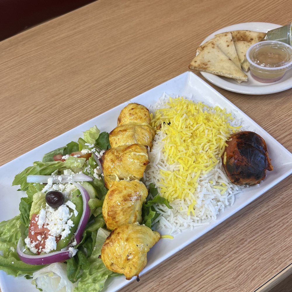 Chicken joojeh with half rice and half salad