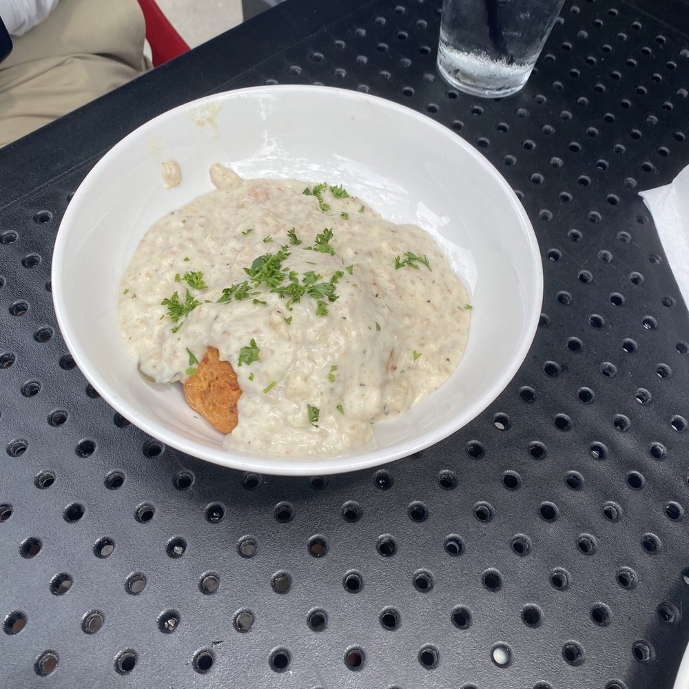 Toast - Biscuit + Gravy ($8) - rosemary parmesan biscuit, turkey sausage gravy, and herbs - Breakfast & Brunch Near Me - Birmingham, Michigan