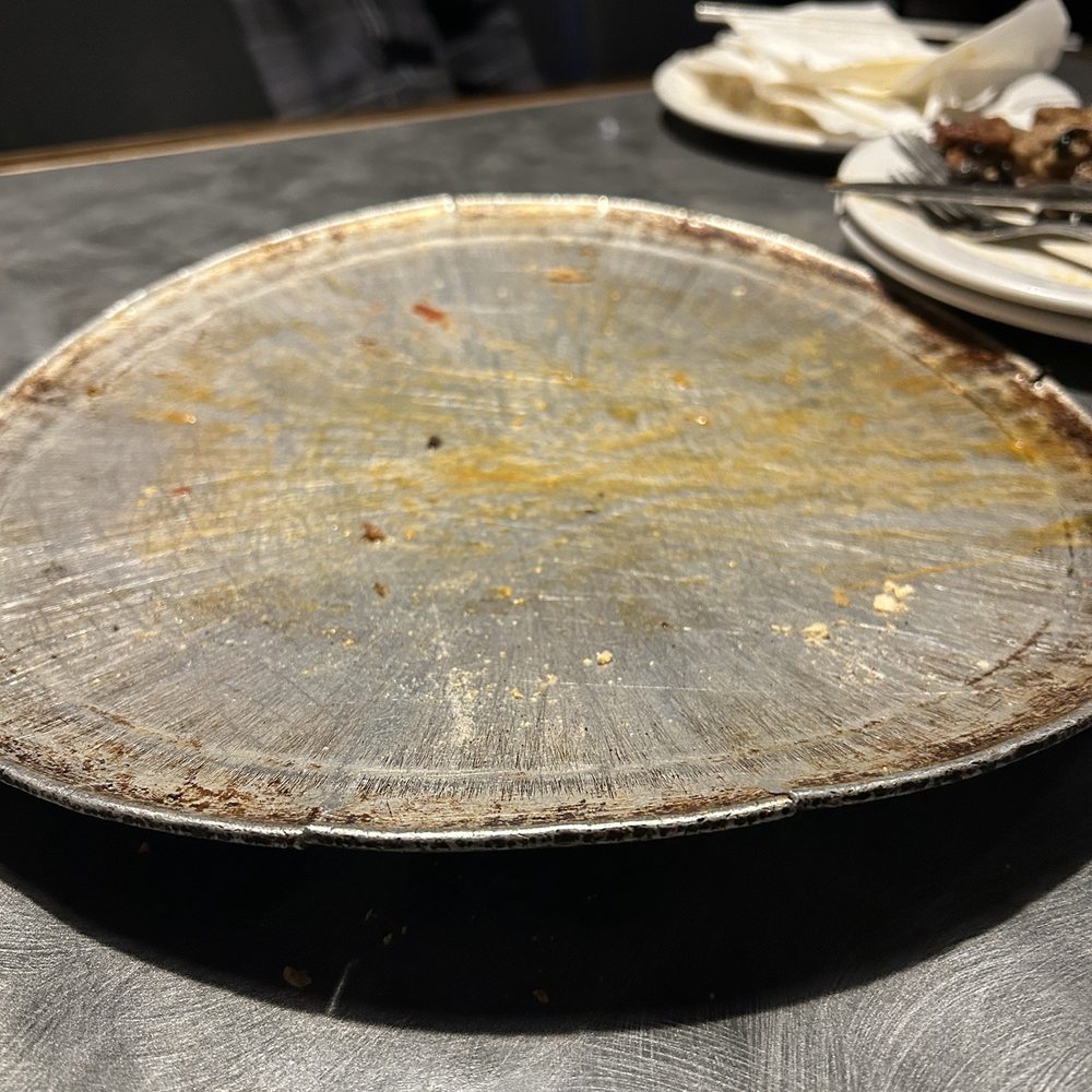 Roma II Pizzeria - Pizza pan off the table - Pizza Near Me - Sacramento, California Roma II Pizzeria - Pizza pan off the table - Pizza Near Me - Sacramento, California