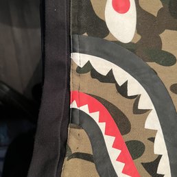 Instead of un sewing the pants they just sewed above the pants Instead of un sewing the pants they just sewed above the pants