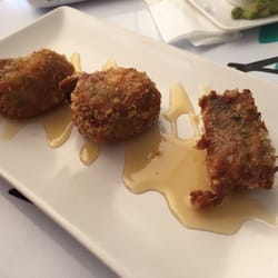 Utopia - Crispy eggplant stuffed with goat cheese and drizzled with honey. Definitely get this!
