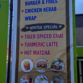BobaLicious & Bites - a sign for a restaurant - Bubble Tea Near Me - Monterey, California
