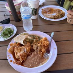 Chilaquiles chile verde nopales con costillitas, rice, beans and hand made tortillas. Chilaquiles chile verde nopales con costillitas, rice, beans and hand made tortillas.