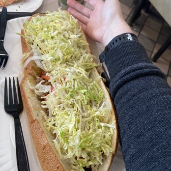 Pats Pizza - For scale. This is fatter than my arm and almost as long!!! - Pizza Near Me - Point Pleasant, New Jersey Pats Pizza - For scale. This is fatter than my arm and almost as long!!! - Pizza Near Me - Point Pleasant, New Jersey