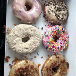 Maple bacon, strawberry sprinkle, cinnamon sugar, blueberry glazed, chocolate chip crumble