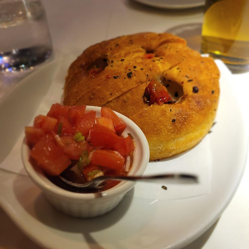 Osteria del Pastaio - House Made Focaccia - served with today's tapenade (very tasty tomatoes) - Italian Near Me - Chicago, Illinois Osteria del Pastaio - House Made Focaccia - served with today's tapenade (very tasty tomatoes) - Italian Near Me - Chicago, Illinois
