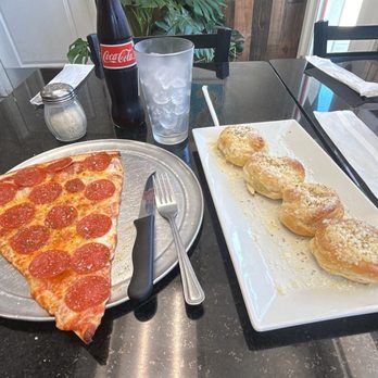 Piccolo Pizza & More - Slice of pizza and garlic rolls - Pizza Near Me - North Miami, Florida Piccolo Pizza & More - Slice of pizza and garlic rolls - Pizza Near Me - North Miami, Florida