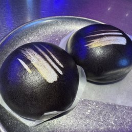 Golden black custard buns