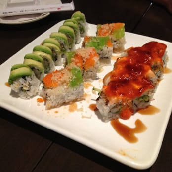 Sushi Huang - a plate of sushi with sauce and avocado - Sushi Bars Near Me - Aurora, Ontario Sushi Huang - a plate of sushi with sauce and avocado - Sushi Bars Near Me - Aurora, Ontario