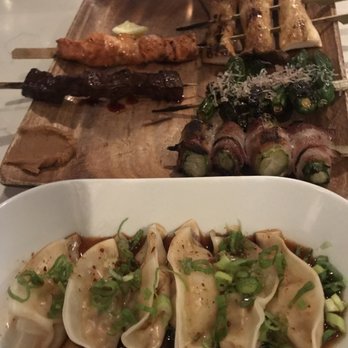 Oak & Coal - Homemade Dumplings, skewers of filet, salmon, mushroom, shishito and pork belly wrapped asparagus. - Japanese Near Me - Costa Mesa, California